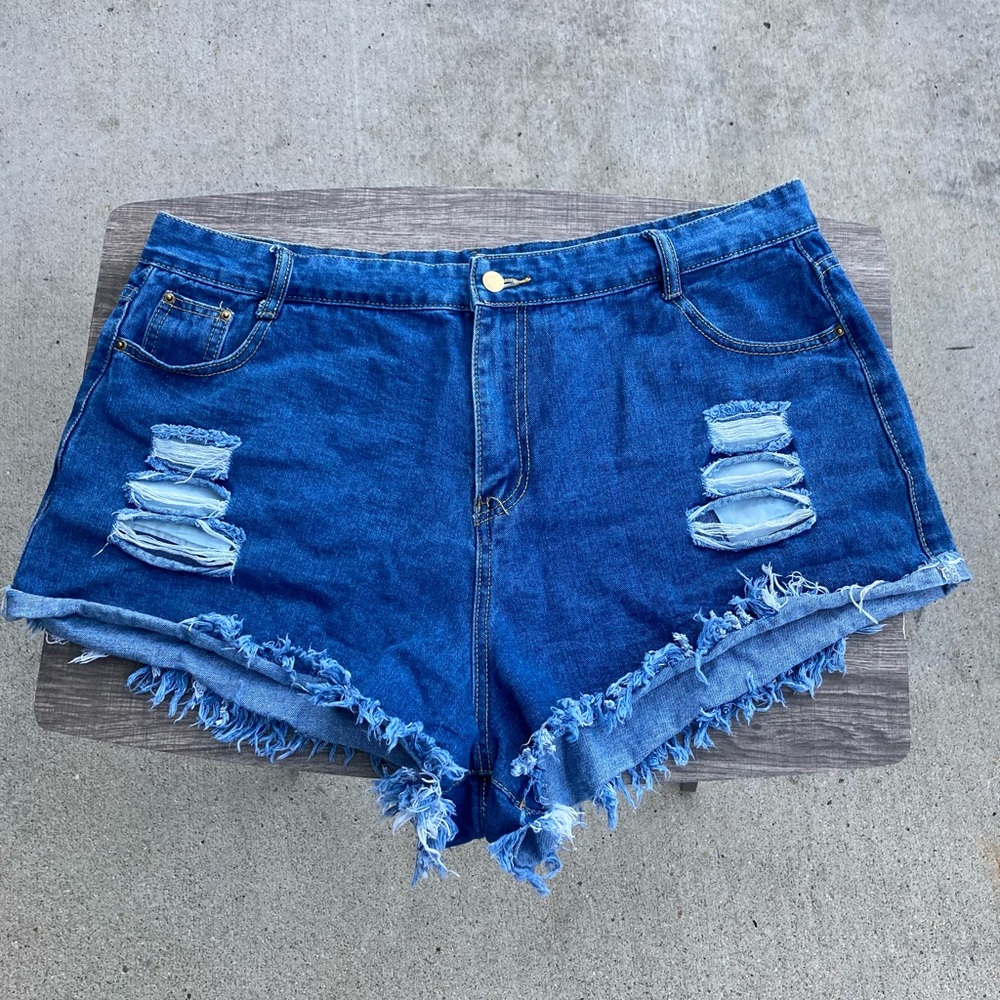 Distressed denim cut offs